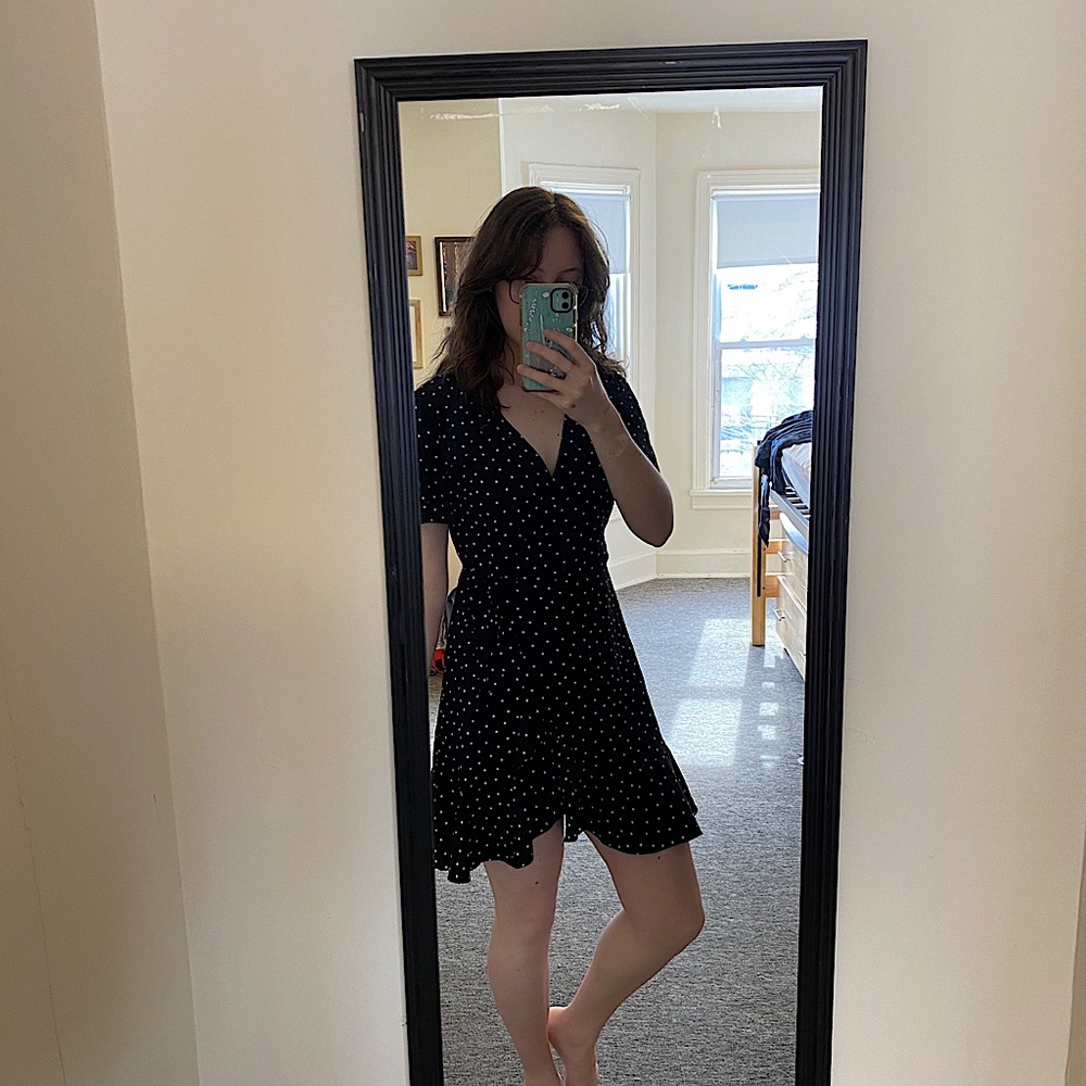 Black and white polka dot mini wrap dress